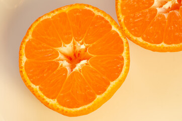 Satsuma orange on white plate