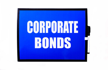 Obraz premium On a blue background a white inscription CORPORATE BONDS