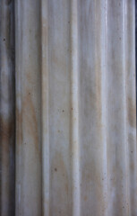 Close up view of white empty Greek marble column background. Vertical.