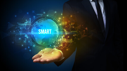 Elegant hand holding SMART inscription, digital technology concept