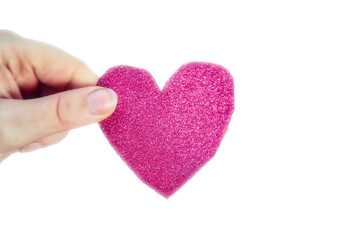 Female hand holding sparkling pink heart isolated on white background for Valentine's Day or romantic, Health concept