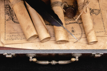 Vintage wooden suitcase with scrolls with wax seal, old map, seal.