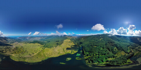 default 360 degree virtual reality panorama of Biviere lake immersed in the beautiful beech forest of Monte Soro in spring on the Nebrodi, Sicily, Italy. Natural lake with views of Mount Etna and sea.