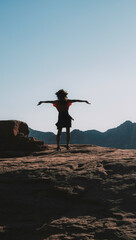 person walking on the beach