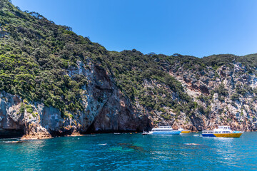 boats in a rocky bay