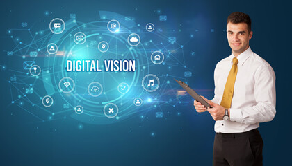 Businessman thinking in front of technology related icons and DIGITAL VISION inscription, modern technology concept