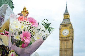 bouquet of colorful flowers with Big Ben in background. London, UK
