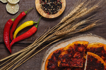 Arabic Fatayer, Petaeer  Flat bread  baked with Hot and spicy paprika on top.Top view.
