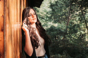 Fototapeta premium Portrait of a beautiful brunette girl. Copy space