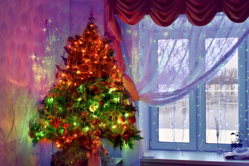 Christmas tree decorated with baubles, garlands and tinsel in the living room. Morning.