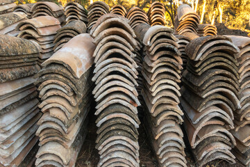 Old roof tiles piled up and saved to use