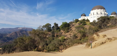 observatory on mountain with palms trees view 