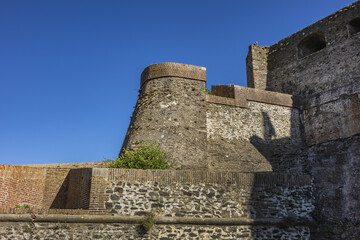 Collioure’s castle (Chateau Royal) built between 1276 and 1344 by counts of Roussillon and kings of Aragon. Outer wall was work of Vauban in 17th century. Collioure, Pyrenees-Orientales, France.