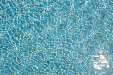 Water swimming pool with sun shining seamless caustic texture. Mosaic..