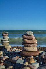 pyramid of stones with sea view