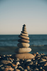 pyramid of stones with sea view