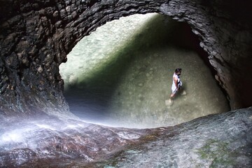 water flowing into the cave