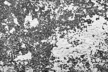 Texture of a concrete wall with cracks and scratches which can be used as a background