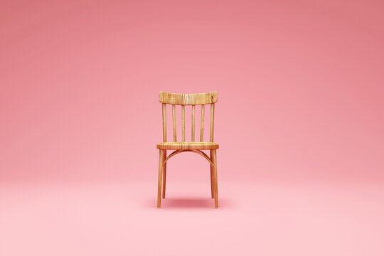 Wooden Chair On Pink Studio Background