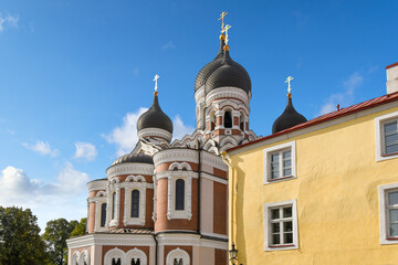 Fototapeta na wymiar The facade and onion domes on the Alexander Nevsky Russian Orthodox Cathedral on Toompea Hill, the upper old town area of Tallinn Estonia.