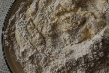 
Flour added to the dough on top