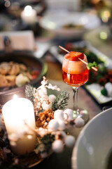 Sweet red berry cocktail on the festive served table