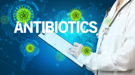 Doctor fills out medical record with ANTIBIOTICS inscription, virology concept