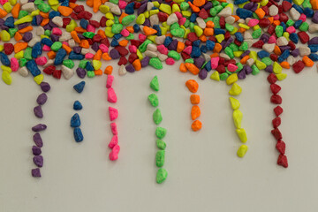 colorful beads and stones on the white background.