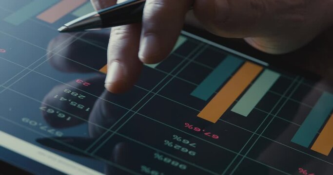 Reviewing business report on digital tablet