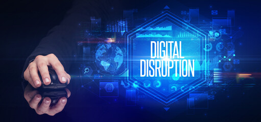 hand holding wireless peripheral with DIGITAL DISRUPTION inscription, cyber security concept