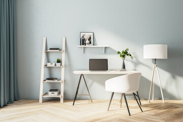 Comfortable home office with laptop on table