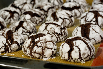 Cooking marbled chocolate chip cookies on black table
