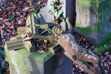 Historic Jesus on the winter mystery old Prague Cemetery, Czech Republic