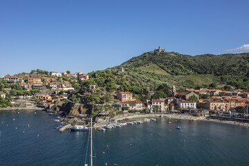 Fototapeta na wymiar Scenic view village of Collioure on the coast of the Mediterranean Sea in south of France. Collioure, Roussillon, Vermilion coast, Pyrenees Orientales, France.