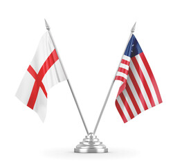 Liberia and England table flags isolated on white 3D rendering