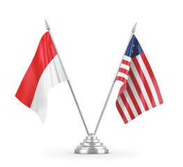 Liberia and Indonesia table flags isolated on white 3D rendering