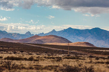 The view of the Dragoon mountains from a rural highway in southern Arizona.
