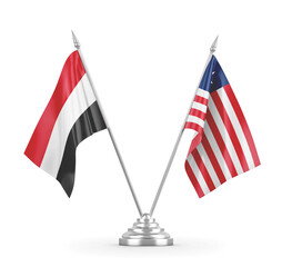 Liberia and Yemen table flags isolated on white 3D rendering