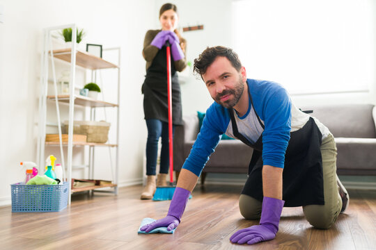 Man Doing House Chores At Home