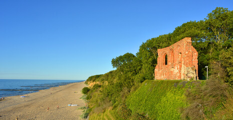 Fototapeta premium Panorama of the baltic sea landscape in Poland with the church ruins in Trzesacz