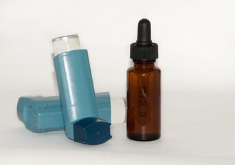 asthma inhaler and salbutamol dropper