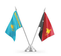 Papua New Guinea and Kazakhstan table flags isolated on white 3D rendering