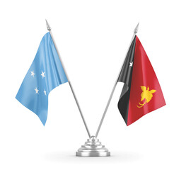 Papua New Guinea and Micronesia table flags isolated on white 3D rendering