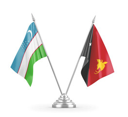 Papua New Guinea and Uzbekistan table flags isolated on white 3D rendering