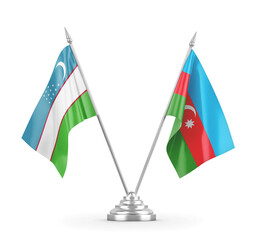 Azerbaijan and Uzbekistan table flags isolated on white 3D rendering