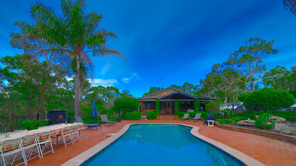 Residential house in Dural a country suburb in Sydney NSW Australia with lush green trees and grass 