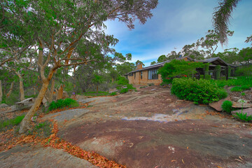 Residential house in Dural a country suburb in Sydney NSW Australia with lush green trees and grass 
