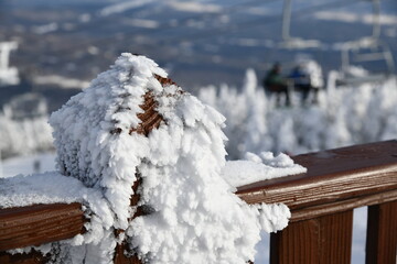 Fresh snow crystals on the observation deck at peak Mansfield summit - Stowe Ski resort, VT