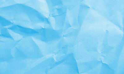 Obraz premium cyan colored crumpled paper texture background for design, decorative.