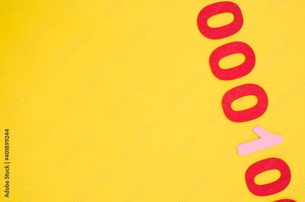 Poster a top view of red and pink binary codes on a bright yellow surface